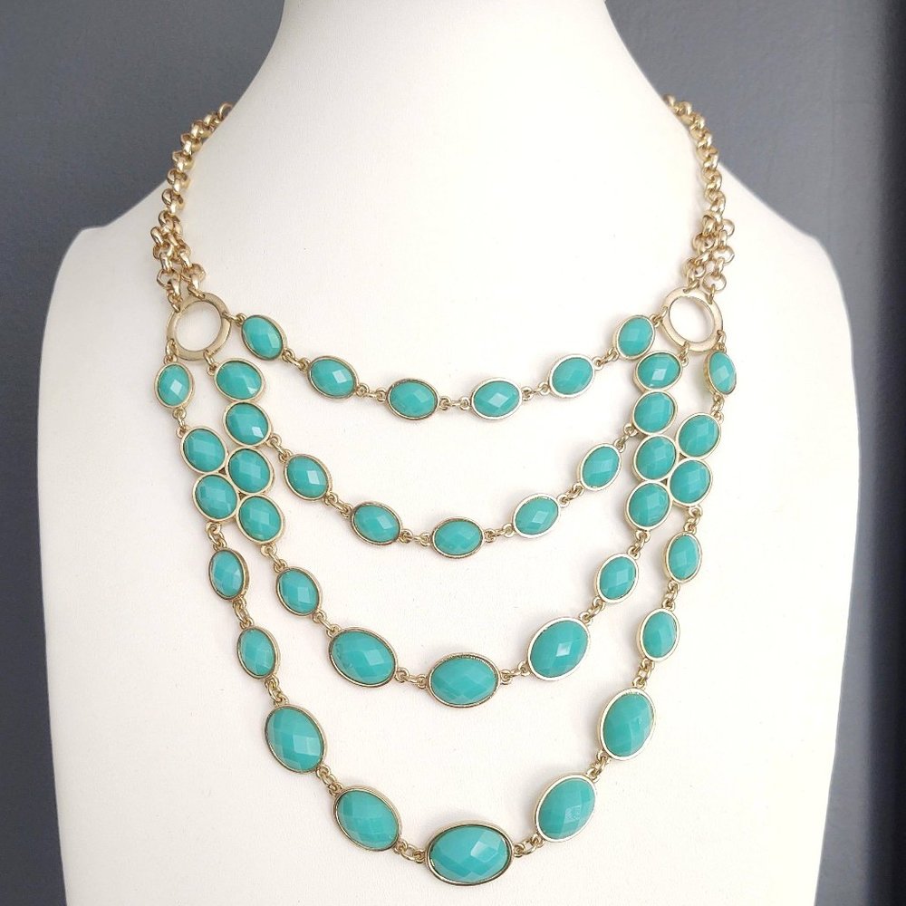 Gold multi strand necklace with turquoise beads